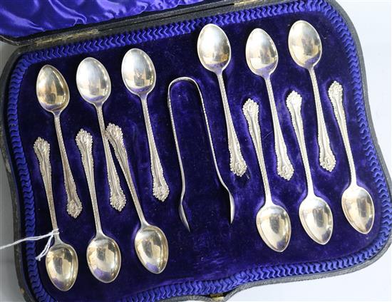 An Edwardian cased set of twelve silver coffee spoons and a pair of sugar tongs, Lee & Wigfull, Sheffield, 1902.